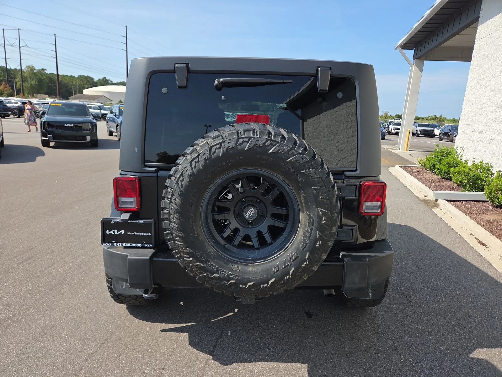 Used 2016 Black Clearcoat Jeep Unlimited Sahara image 4