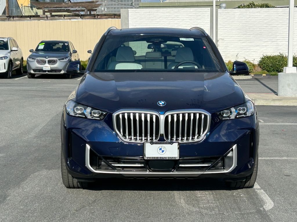 New 2026 Tanzanite Blue II Metallic BMW xDrive50e image 8