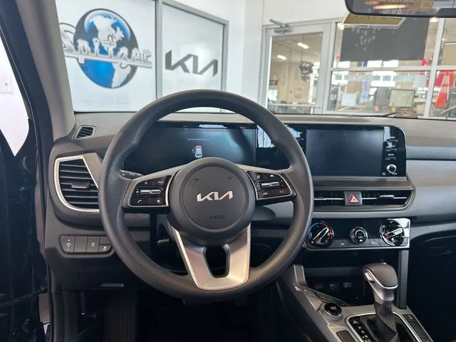 Certified Used 2025 Blue Kia LX image 13