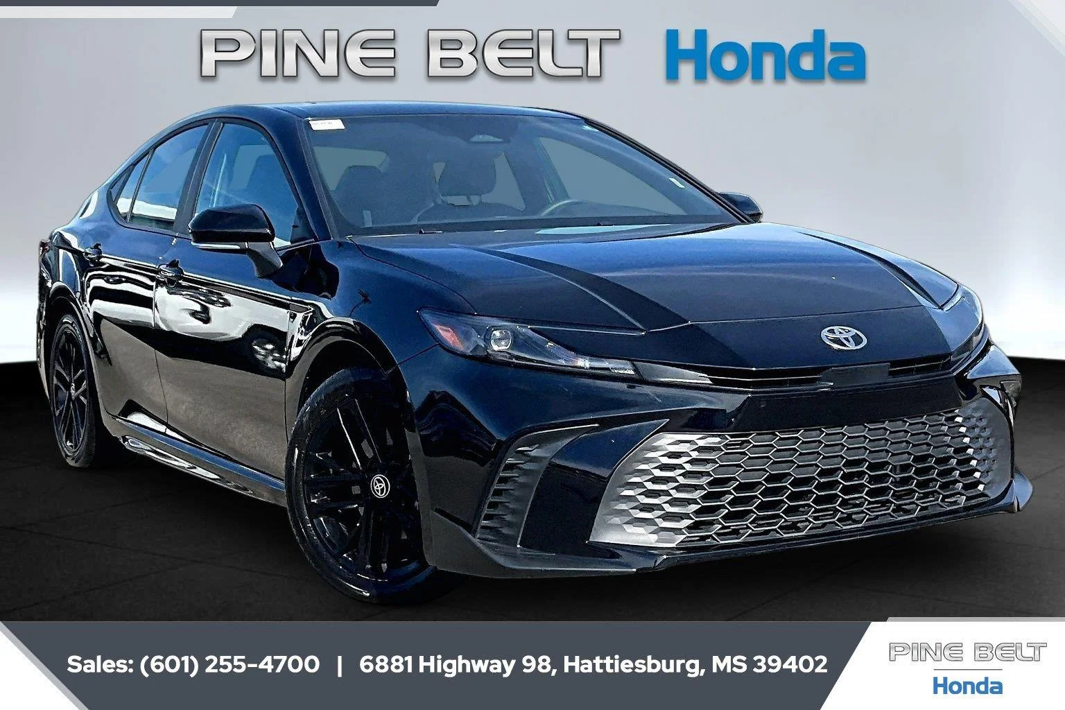 Used 2026 Midnight Black Metallic Toyota LE image 1