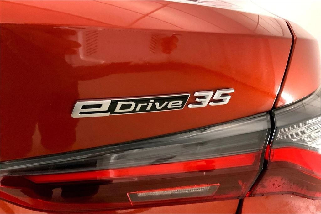Used 2023 Sunset Orange Metallic BMW  image 29
