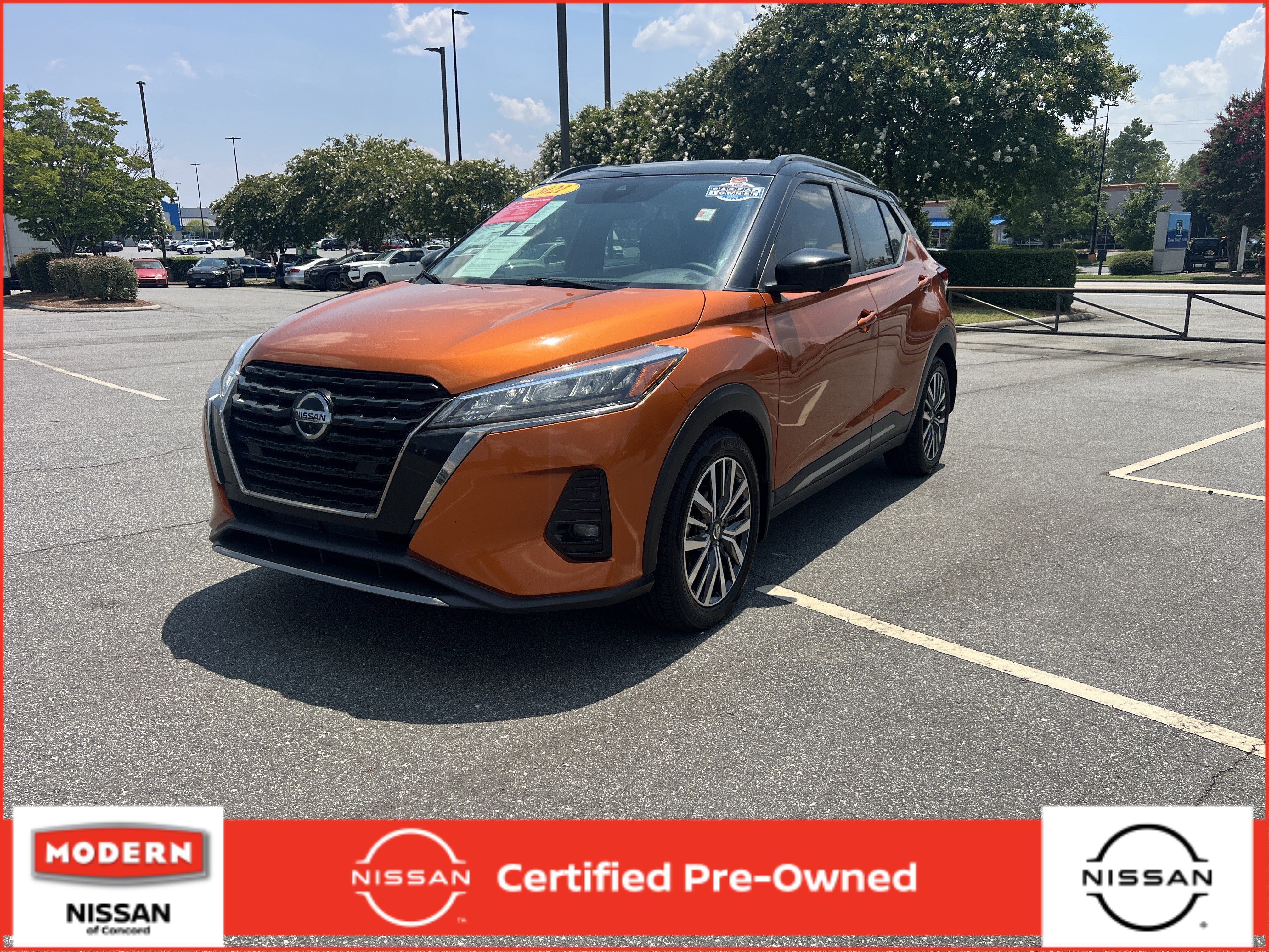 Used 2021 Monarch Orange/Super Black Nissan SR image 1