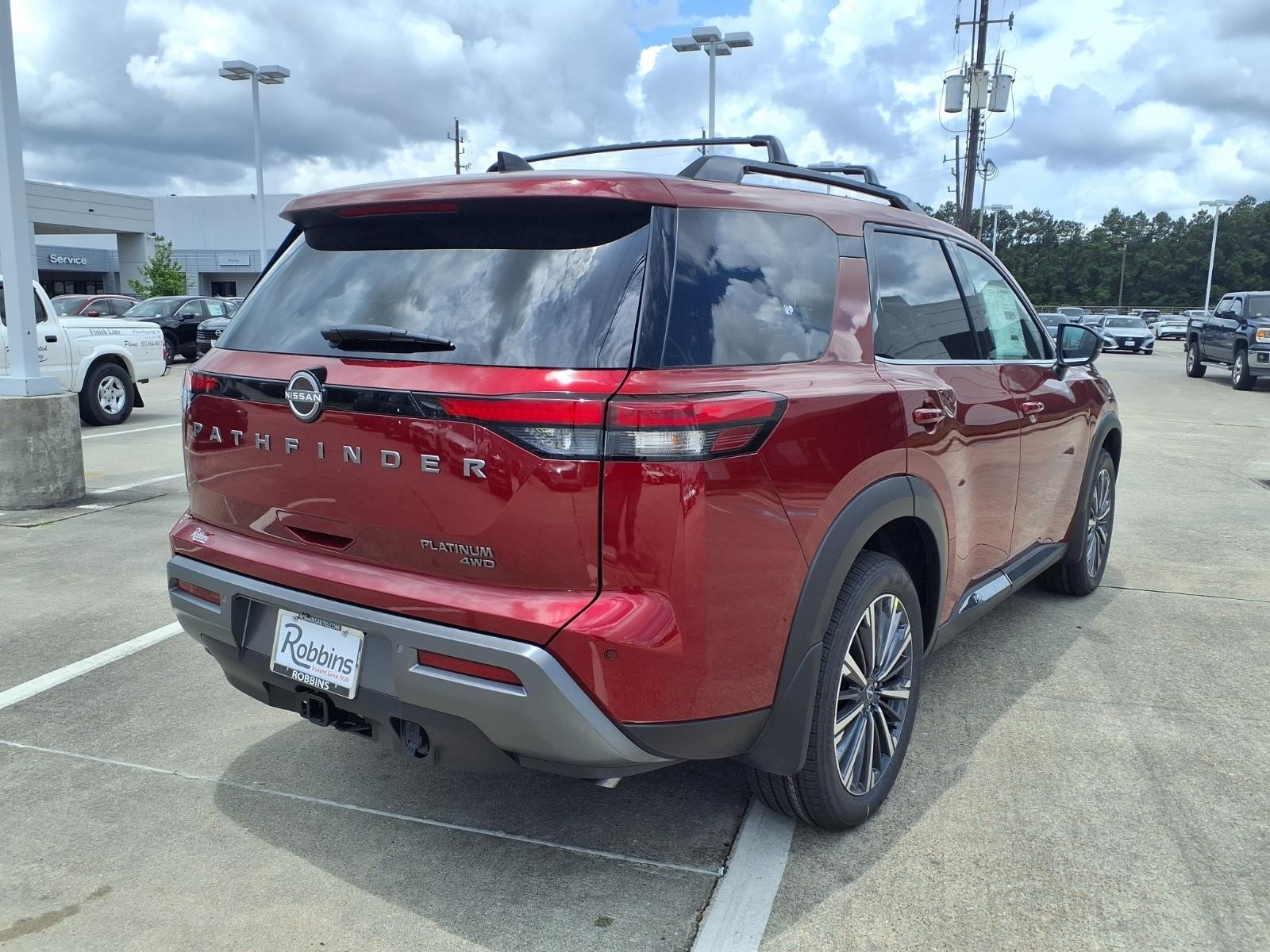 2026 Nissan Pathfinder Platinum Red at Robbins Nissan