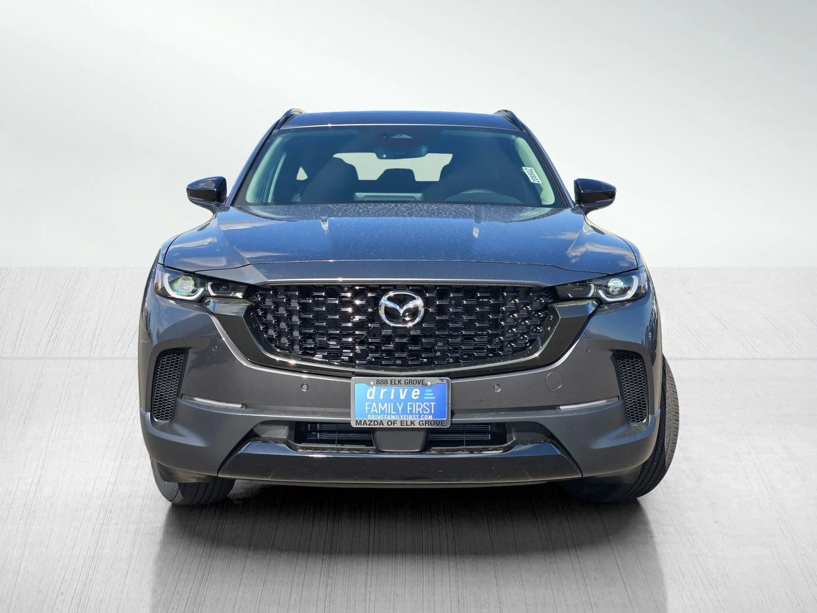 New 2026 Machine Gray Metallic Mazda Premium AWD image 2