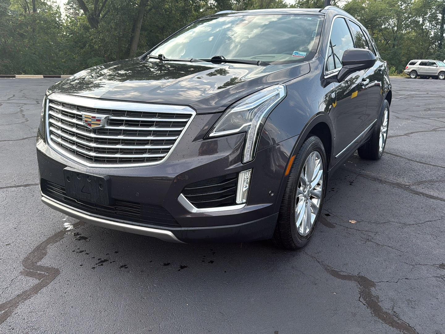 Used 2017 DARK GRANITE METALLIC Cadillac Platinum AWD image 1