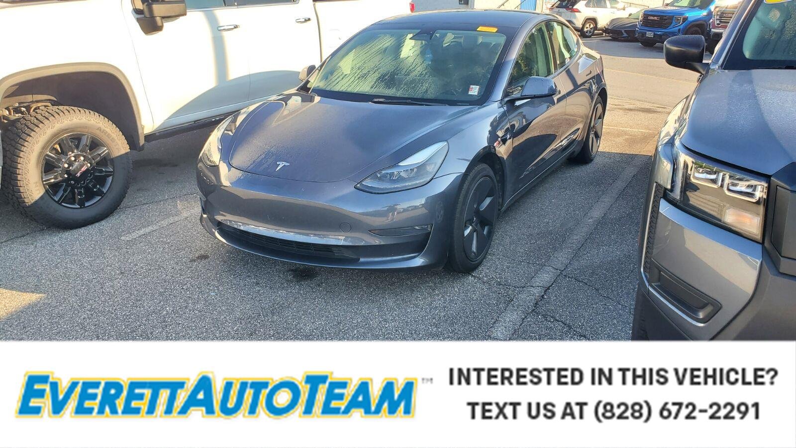 Used 2023 Midnight Silver Metallic Tesla RWD image 1