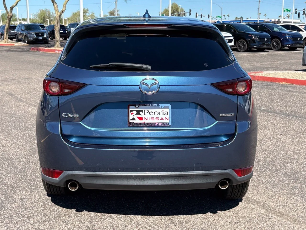 Used 2021 Eternal Blue Mica Mazda Touring image 4