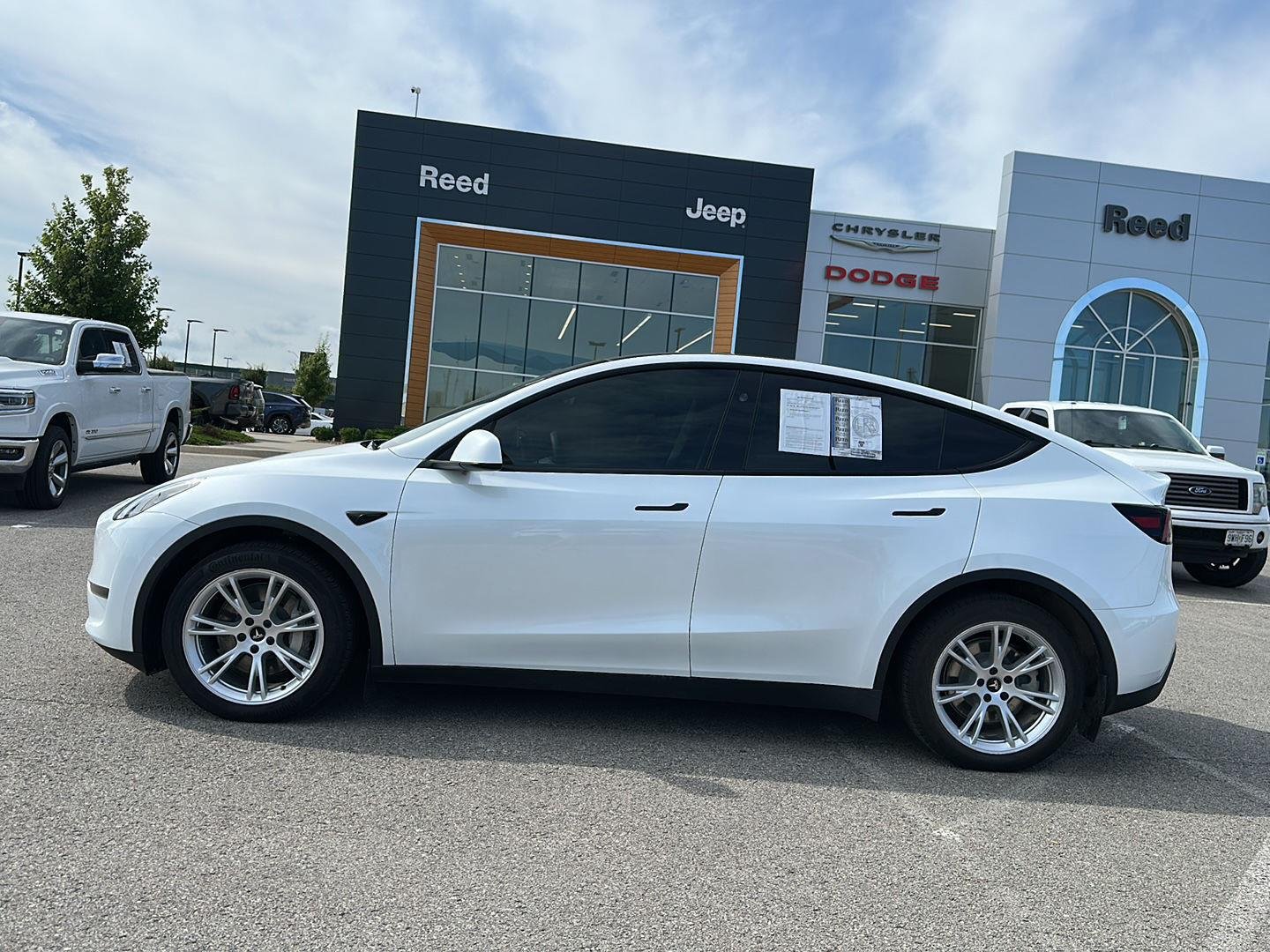 Used 2024 Tesla Model Y Long Range with VIN 7SAYGDEEXRA284777 for sale in Kansas City