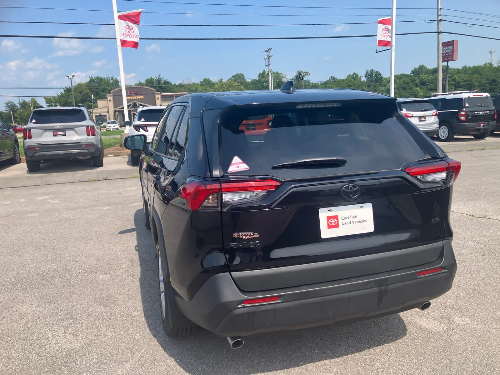 Certified Used 2025 Midnight Black Metallic Toyota LE image 8