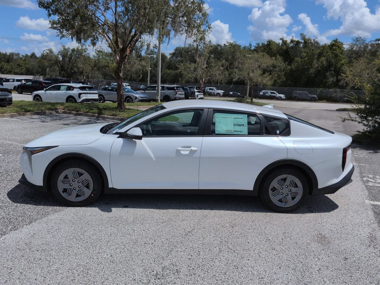 New 2026 Snow White Pearl Kia LX image 8
