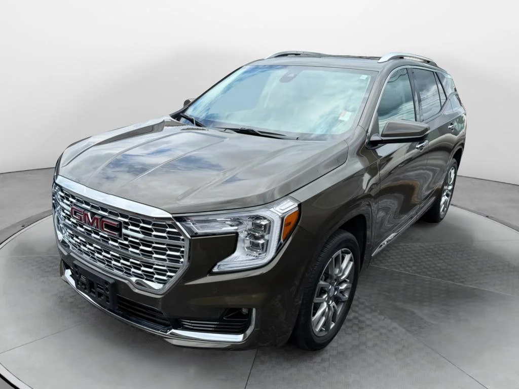 Used 2023 Deep Bronze Metallic GMC Denali image 1
