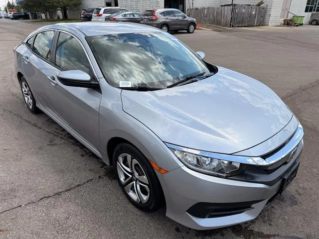 Certified Used 2016 Lunar Silver Metallic Honda LX image 1