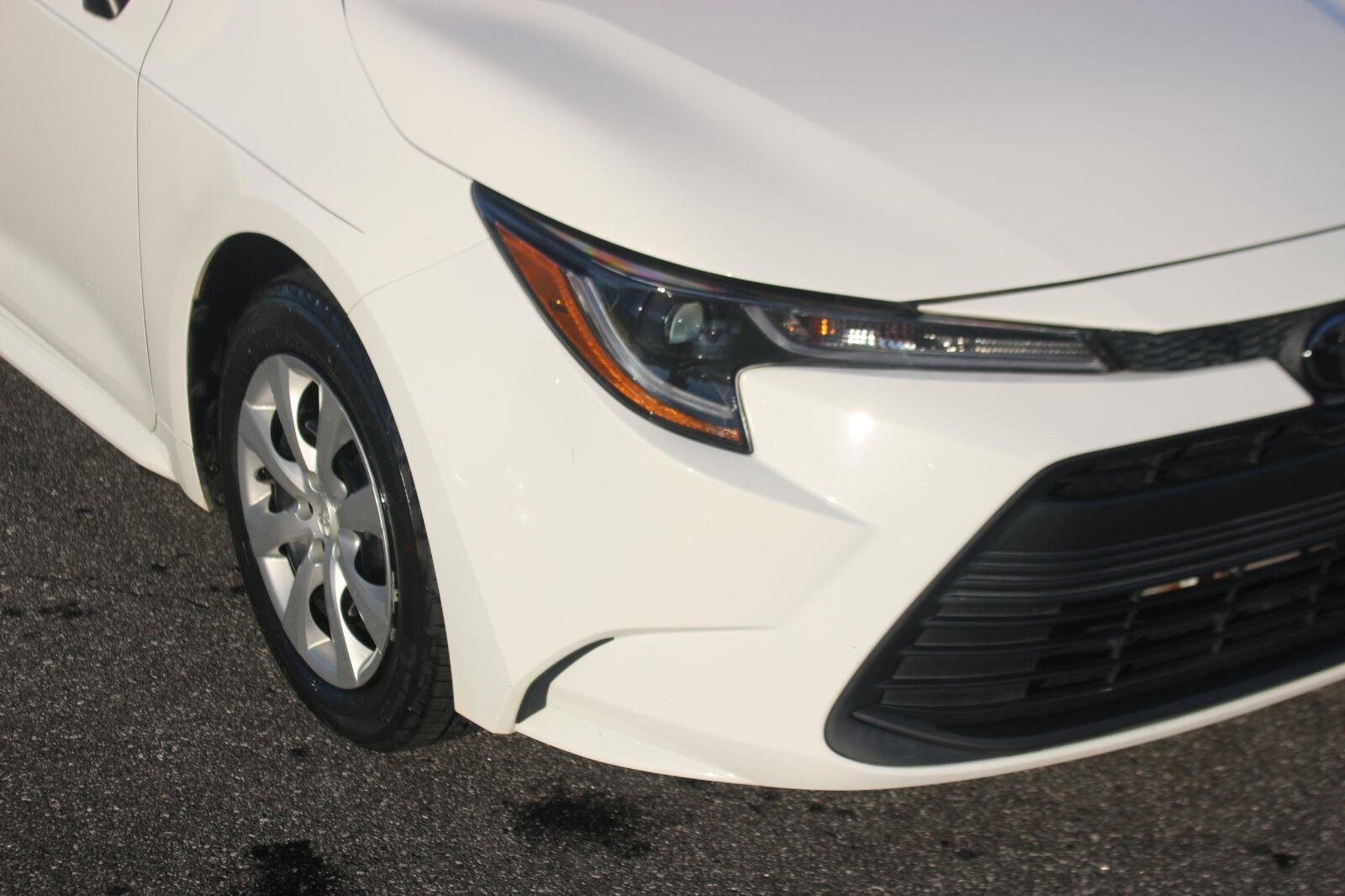 Used 2024 White Toyota LE image 9