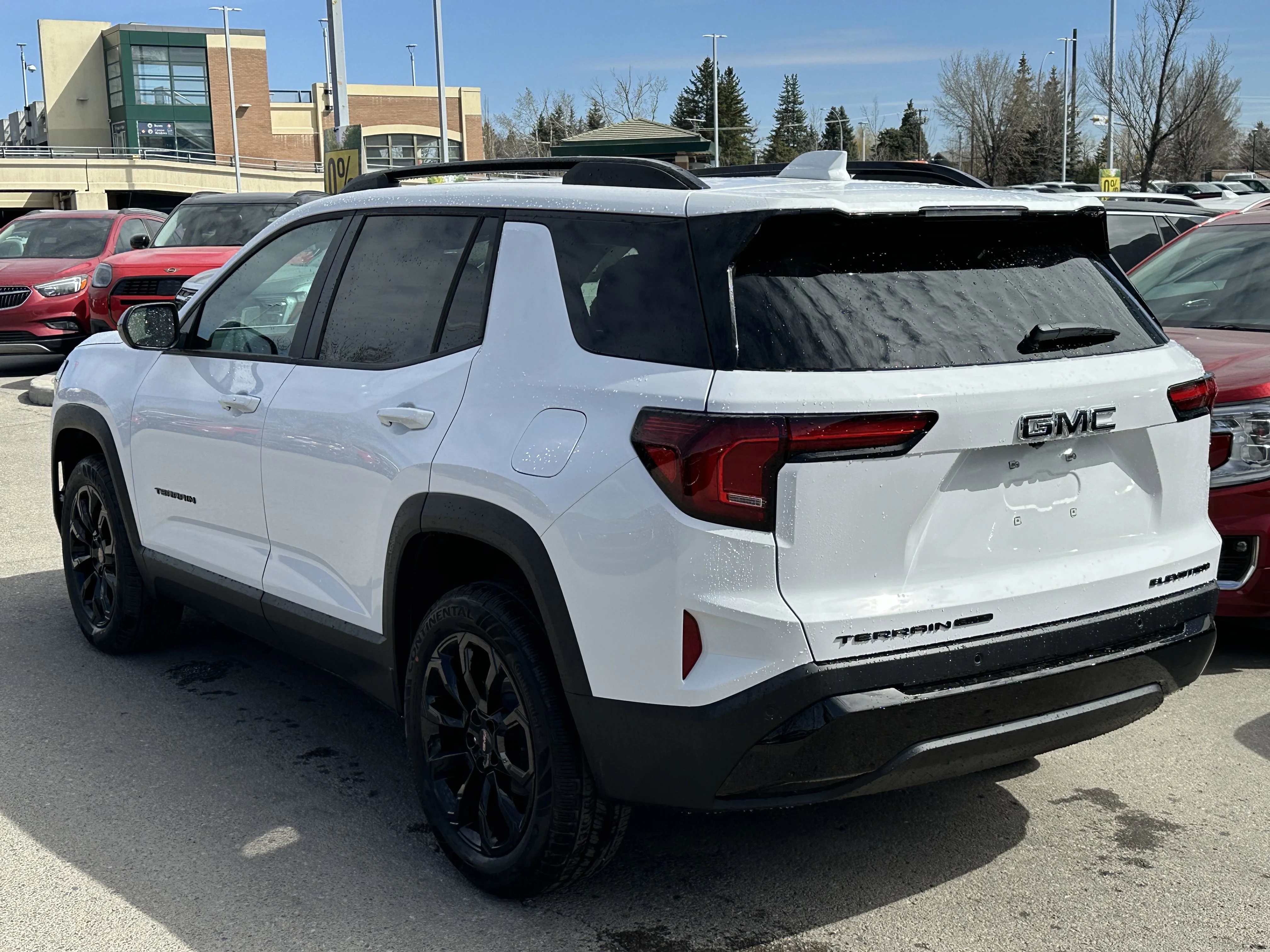 New 2026 Summit White GMC AWD Elevation image 4