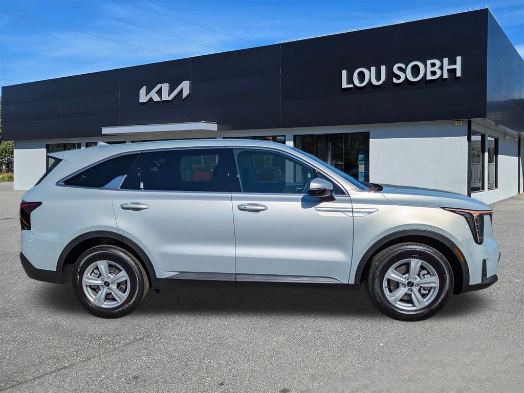 New 2026 Ivory Silver Kia LX image 2