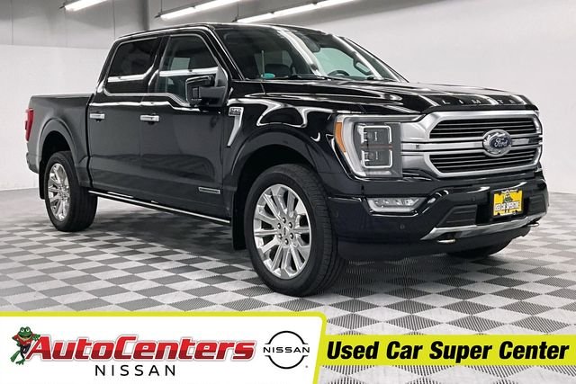 Used 2023 Agate Black Metallic Ford Limited image 1