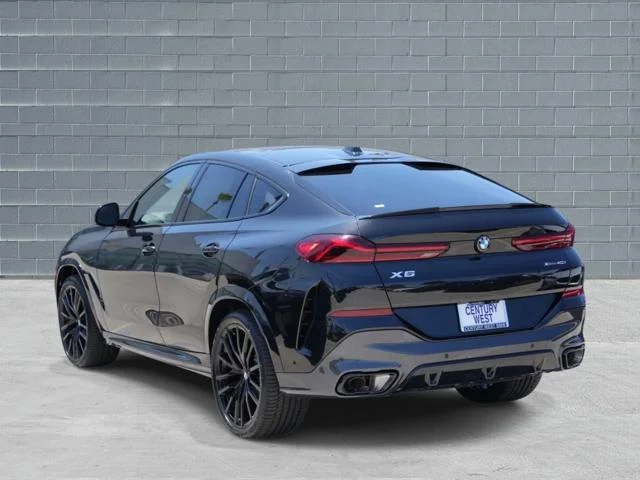 Used 2027 Black Sapphire Metallic BMW xDrive40i Sports Activity Coupe image 3
