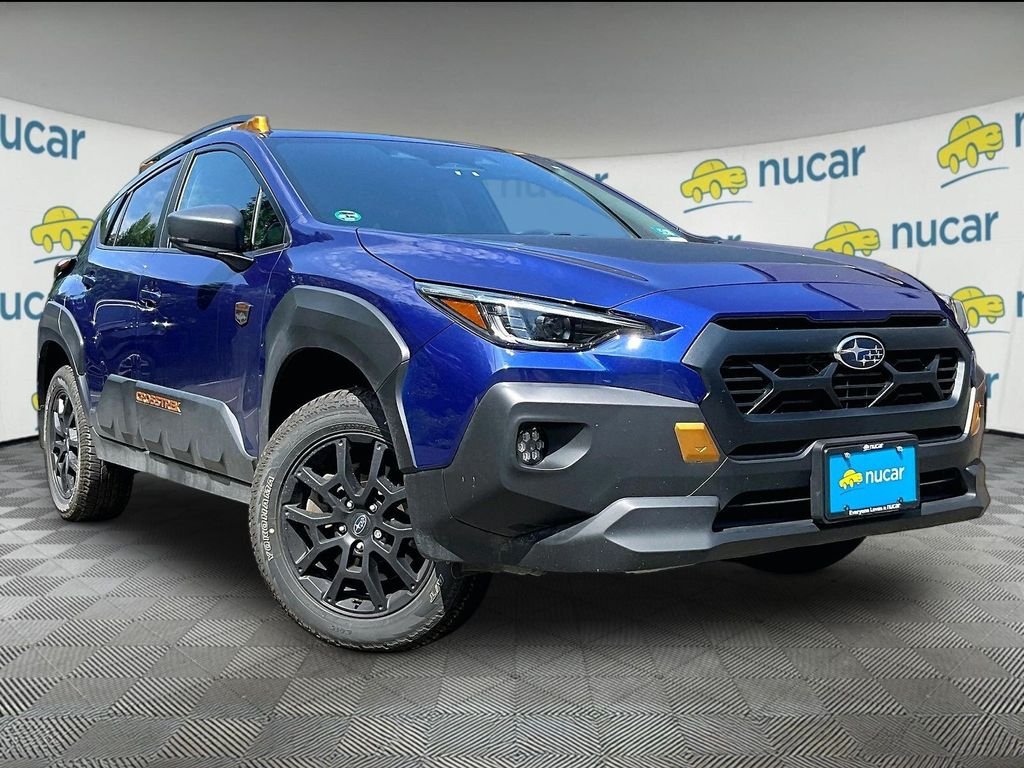 Used 2025 Blue Subaru Wilderness image 1