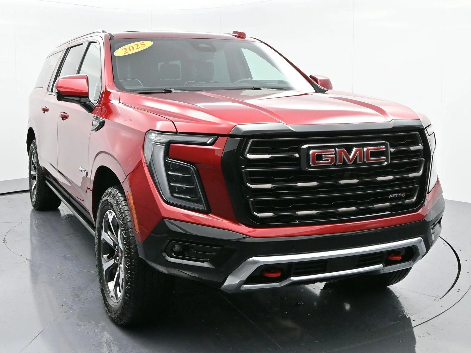 Used 2025 Volcanic Red Tintcoat GMC AT4 Ultimate image 2