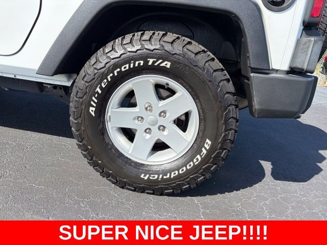 Used 2017 Bright White Clea Jeep Sport image 10