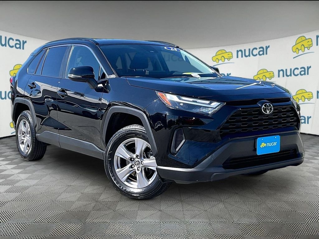 Used 2024 Midnight Black Metallic Toyota XLE image 1