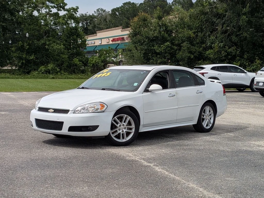 Used 2014 White Chevrolet LTZ image 1