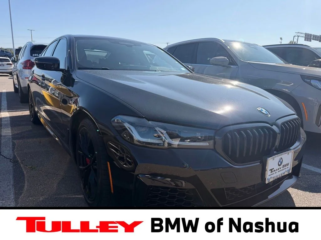 Used 2022 Black Sapphire Metallic BMW M550i xDrive image 1