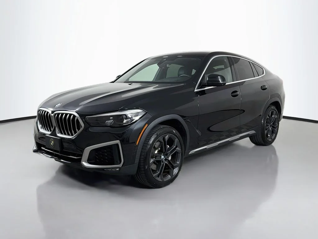 Used 2021 Black BMW sDrive40i image 1