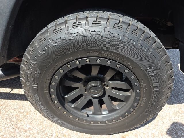 Used 2014 Orange Jeep Sport image 5