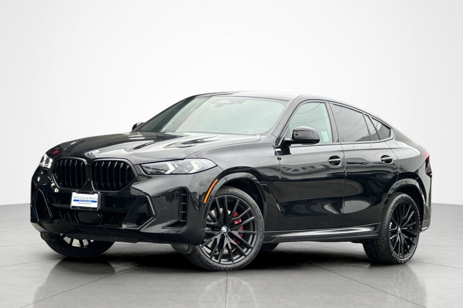 Used 2025 Black Sapphire Metallic BMW xDrive40i image 1