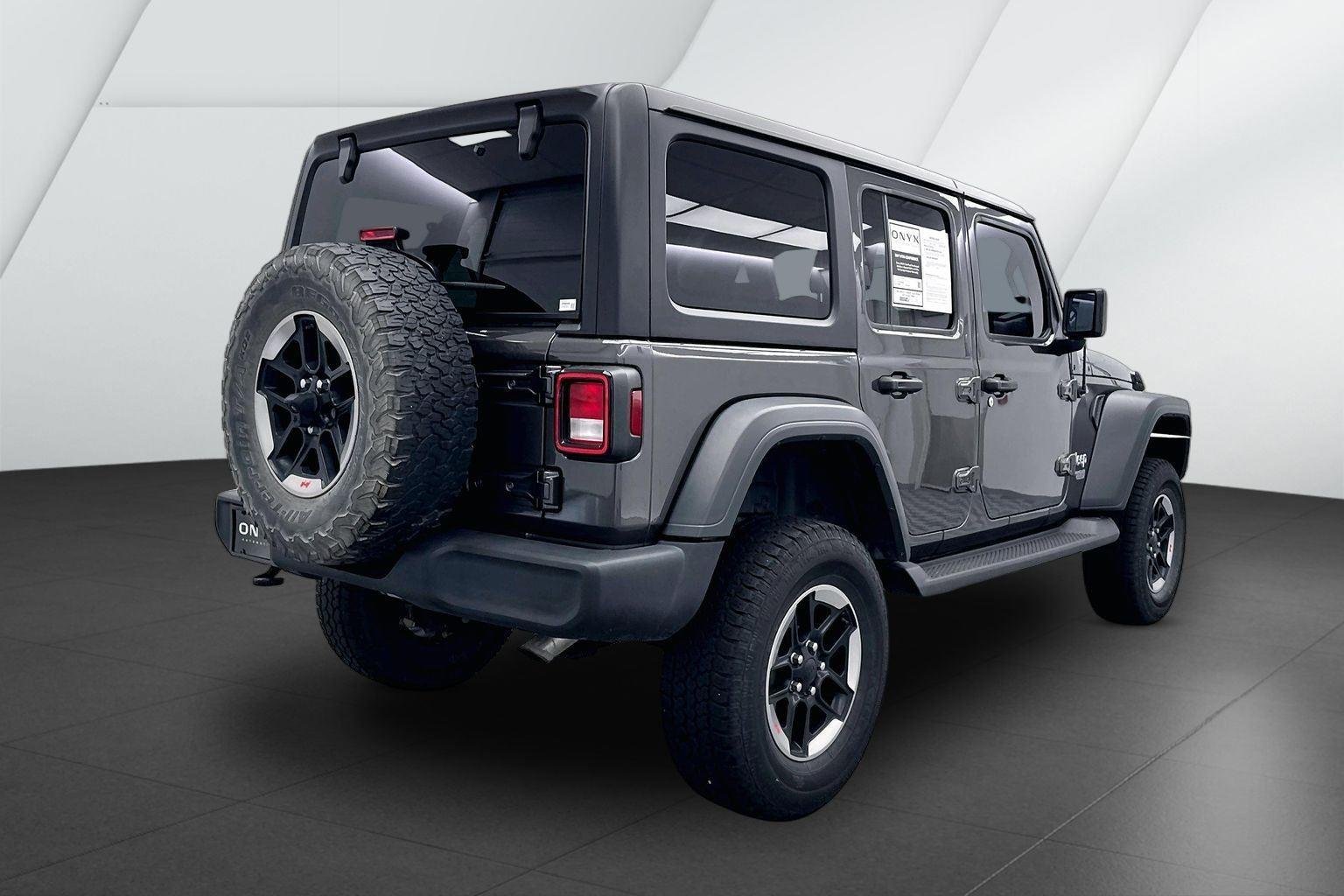 Used 2018 Granite Crystal Metallic Clearcoat Jeep Sport image 6