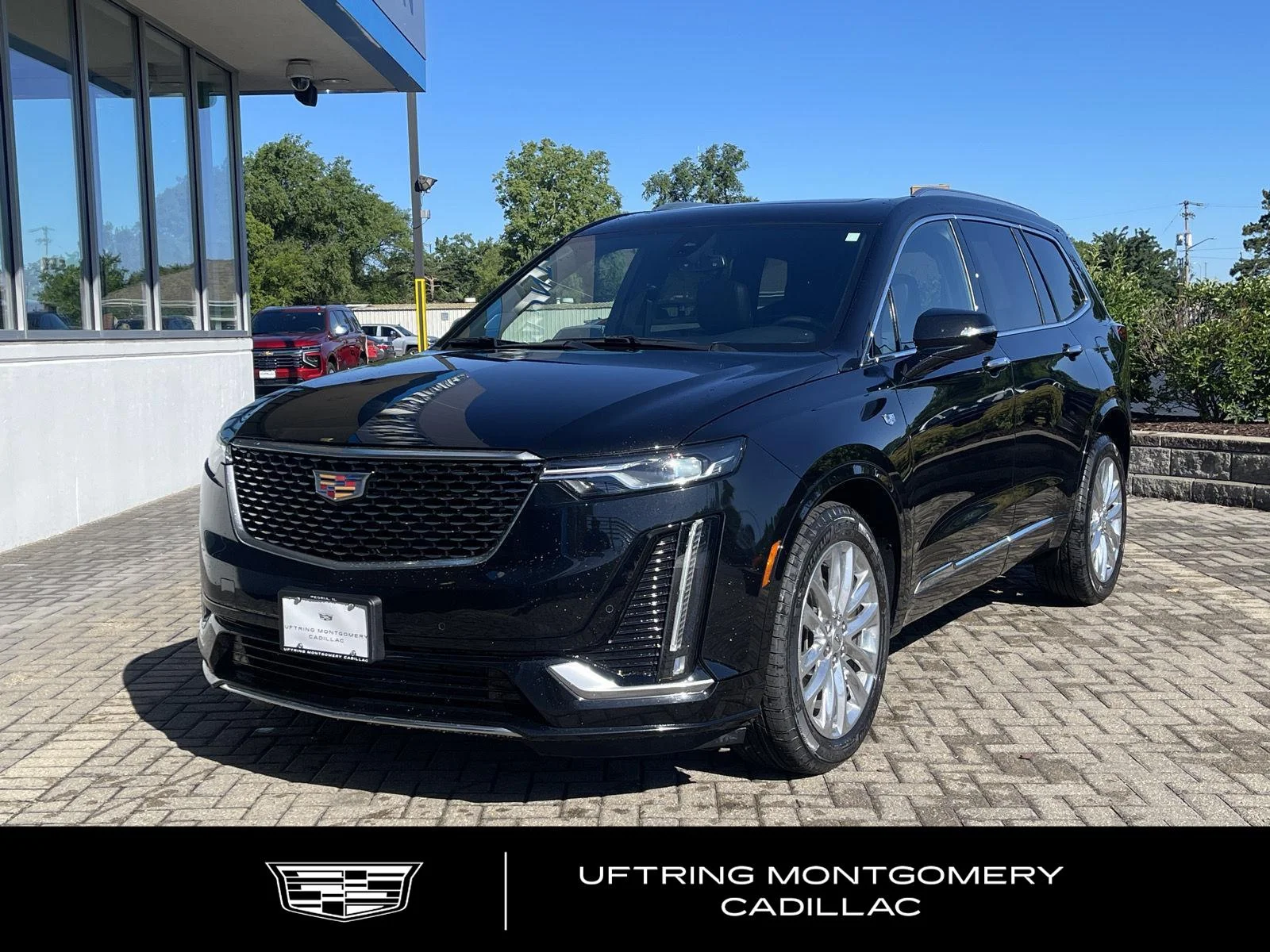 Used 2024 Stellar Black Metallic Cadillac Premium Luxury image 1