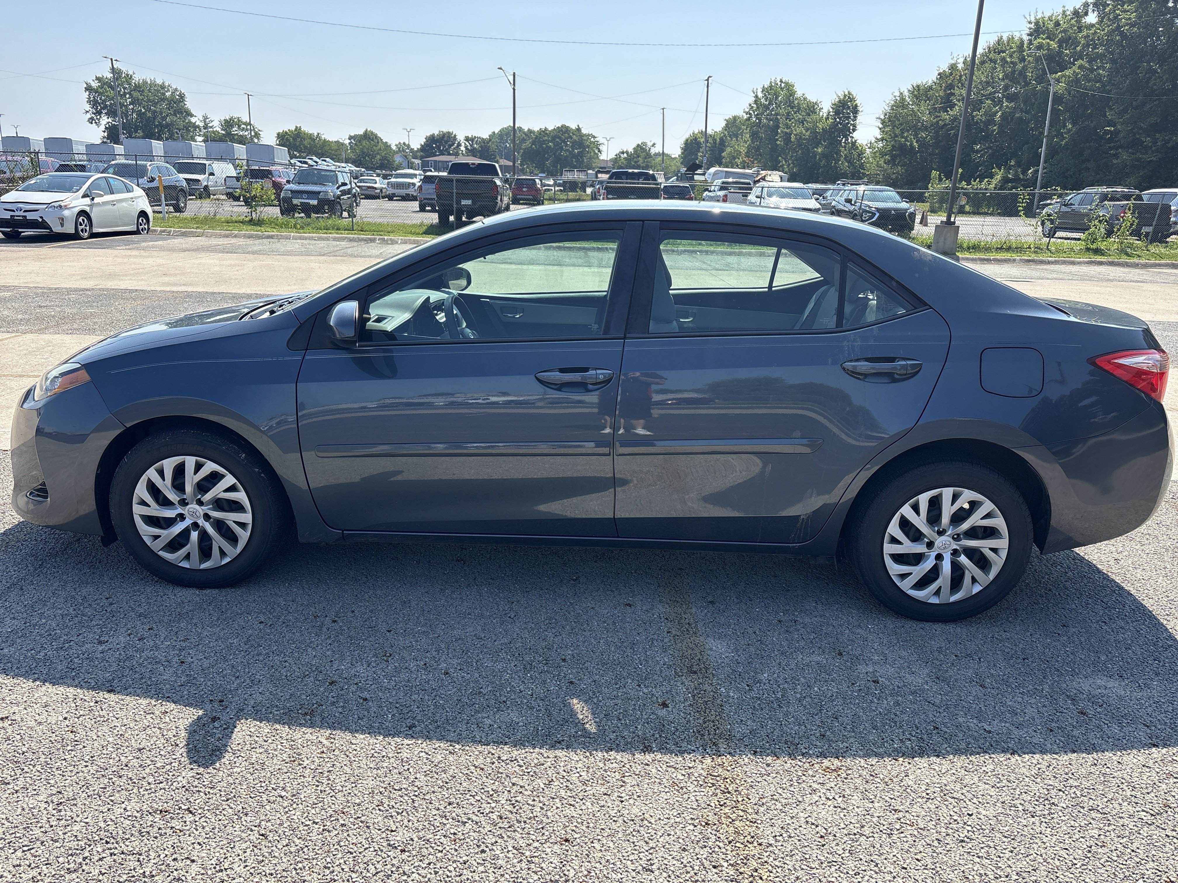 Used 2017 Slate Metallic Gray Toyota LE image 1