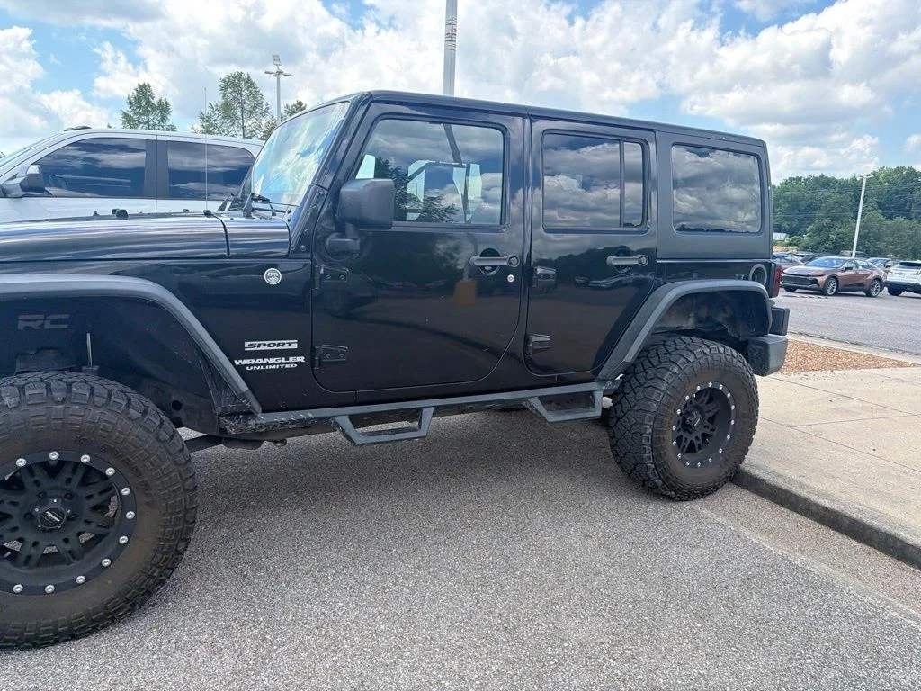 Used 2015 Black Jeep Unlimited Sport image 2