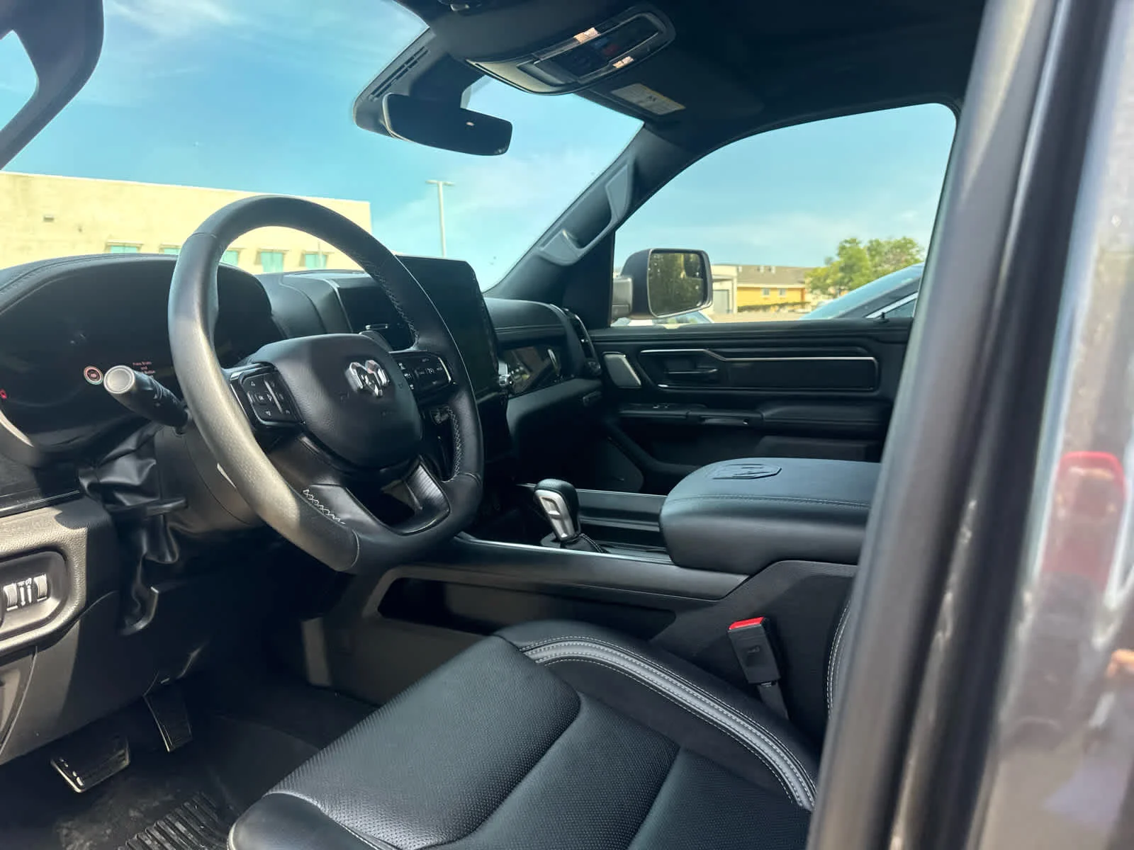 Used 2025 Granite Crystal Metallic Clearcoat Ram Rebel image 9