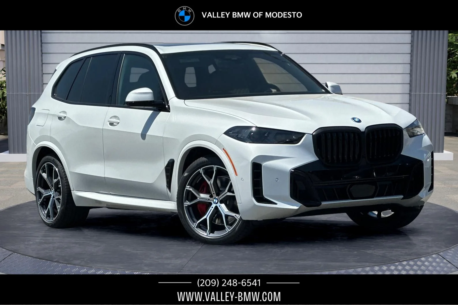 New 2026 Mineral White Metallic BMW xDrive50e image 1