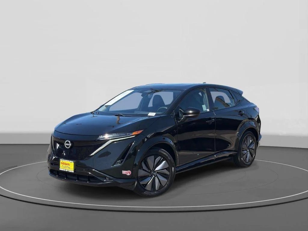 Used 2024 Black Diamond Pearl Nissan EVOLVE+ image 1