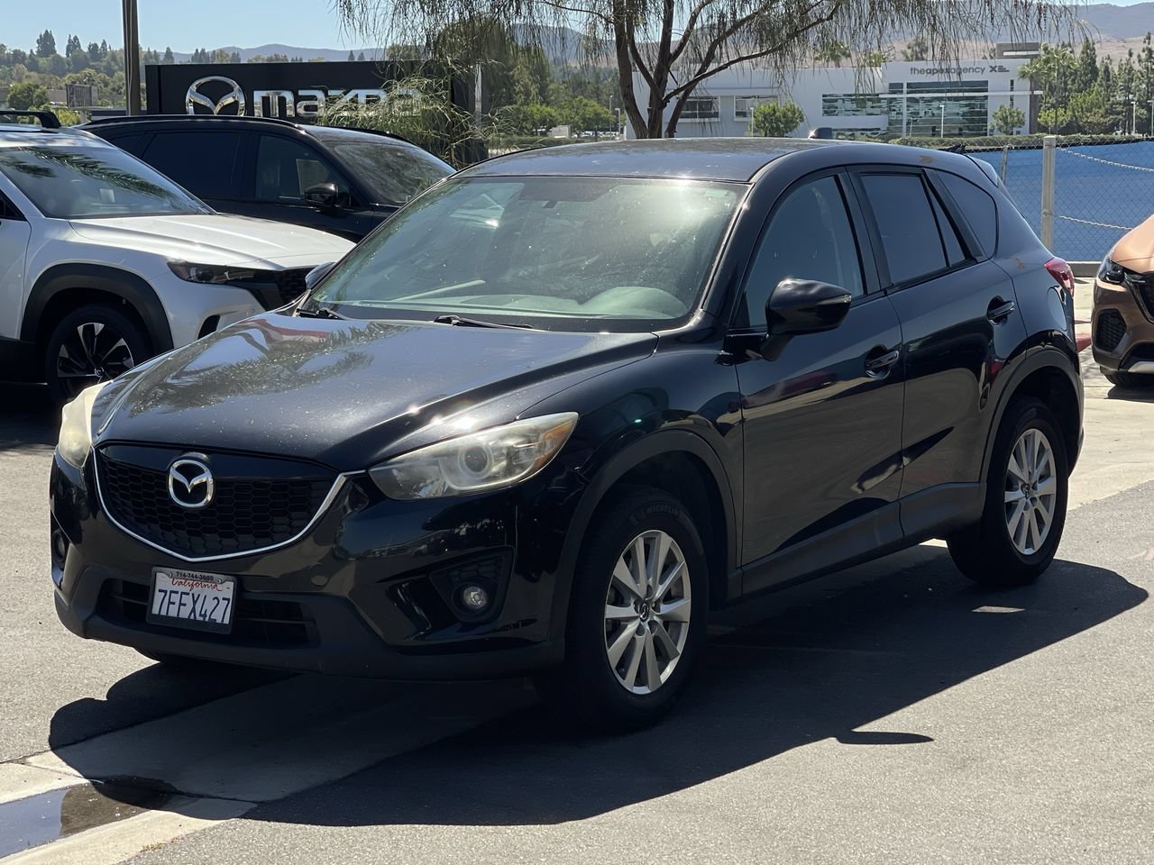 Used 2015 Jet Black Mica Mazda Touring image 2