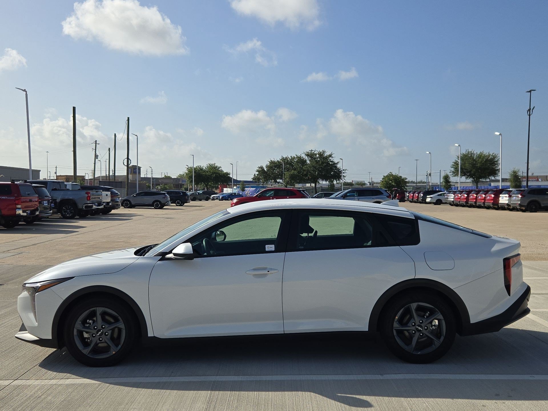 Used 2025 Snow White Pearl Kia LXS image 6