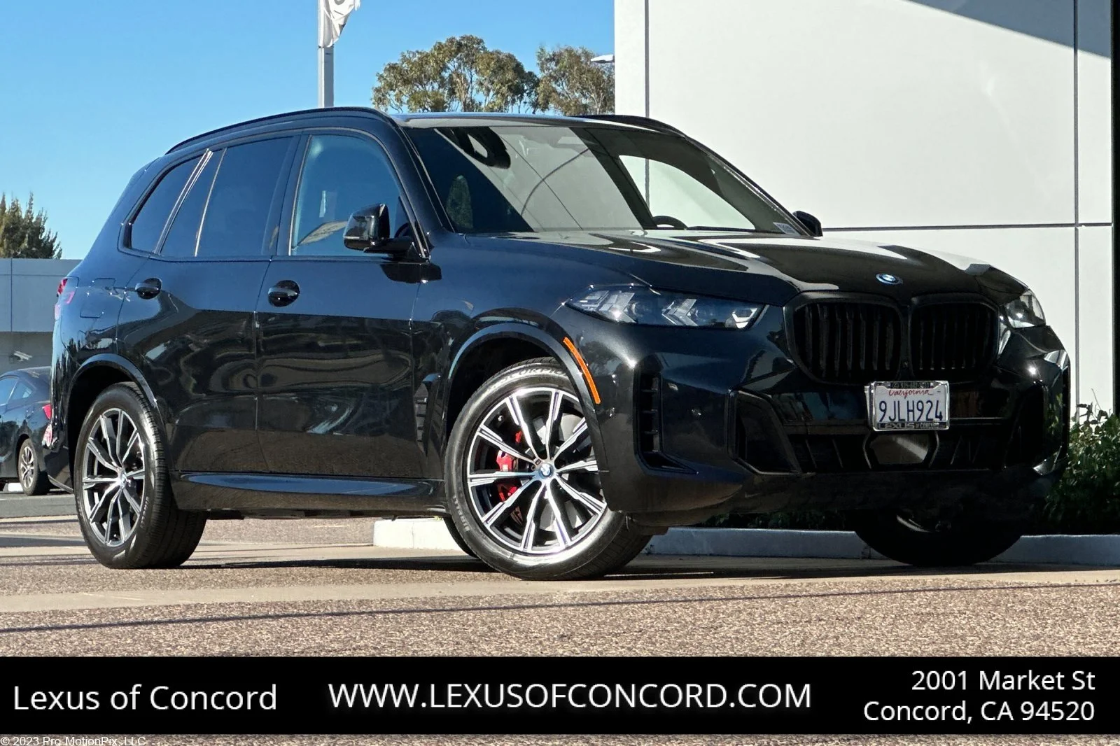 Used 2024 Black Sapphire Metallic BMW xDrive50e image 1