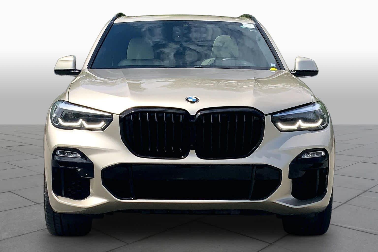 Used 2019 Sunstone Metallic BMW xDrive50i image 4