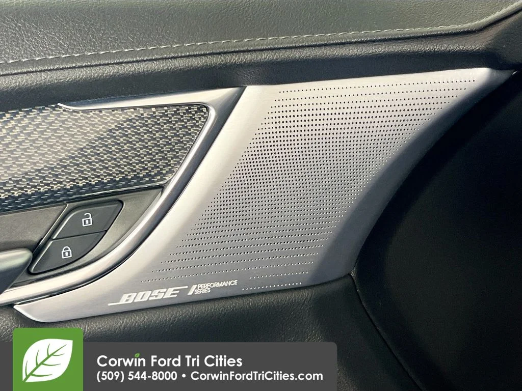 Used 2023 Stellar Black Metallic Cadillac Sport image 13