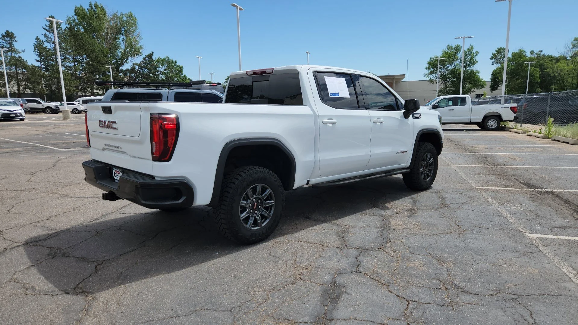 Used 2025 Summit White GMC AT4X image 10
