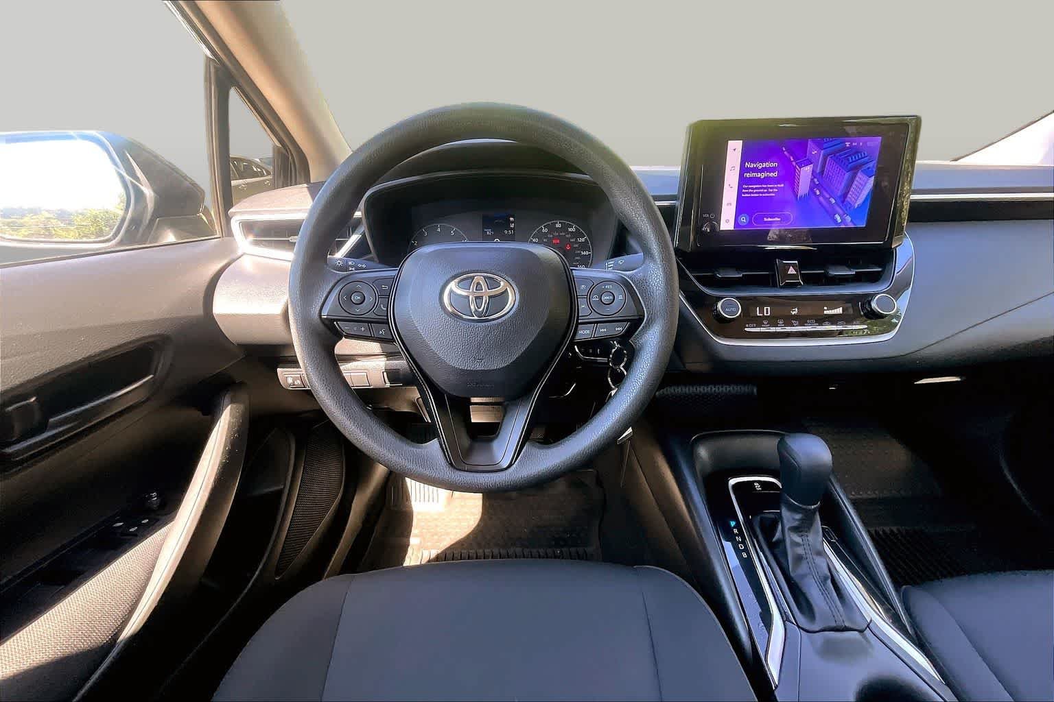 Used 2024 Midnight Black Metallic Toyota LE image 10