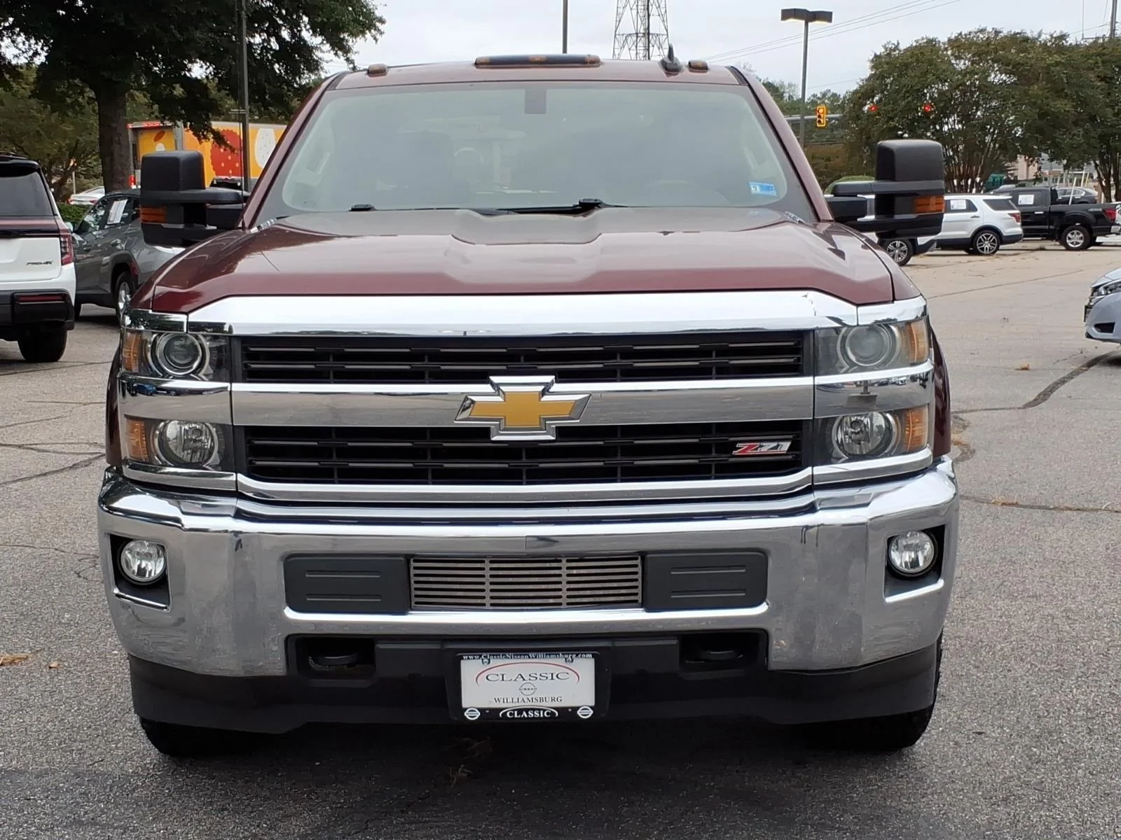 Used 2016 Butte Red Metallic Chevrolet LT image 2