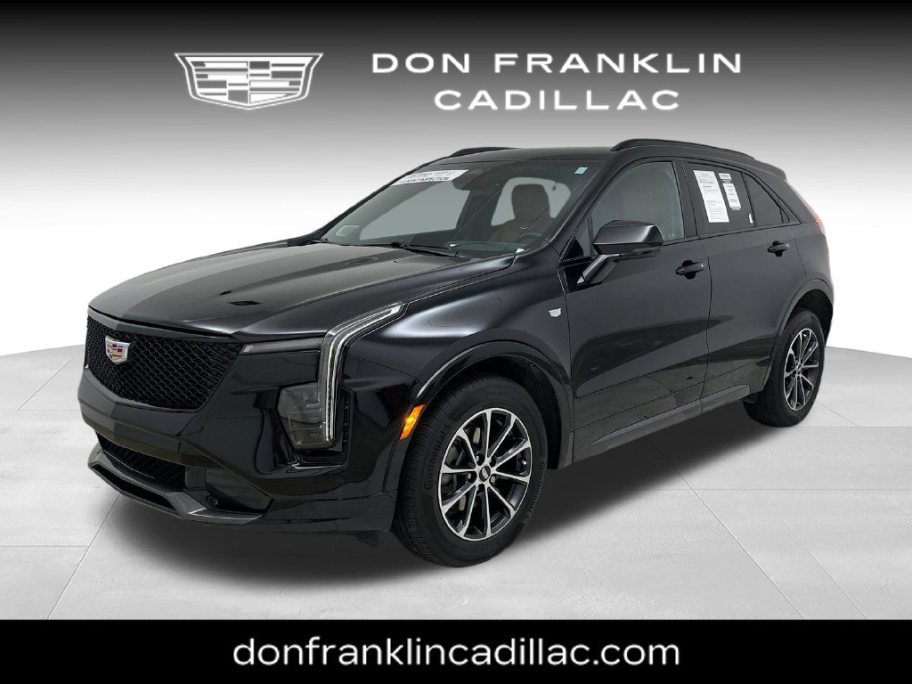 Used 2024 Black Cadillac Sport image 1