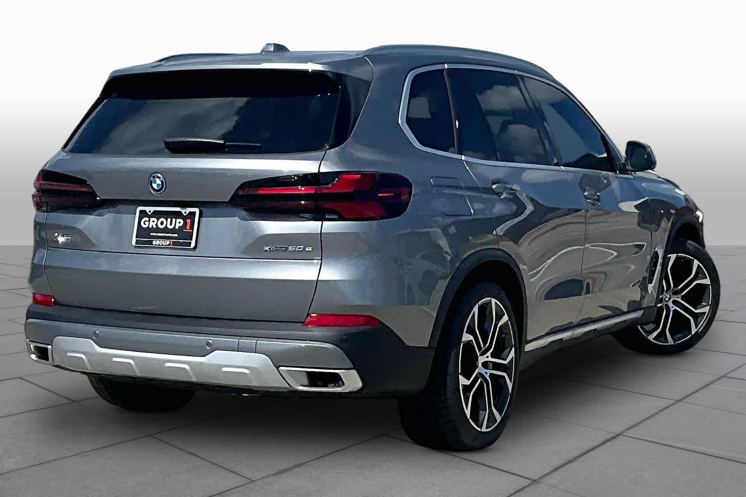 Used 2026 Skyscraper Grey Metallic BMW xDrive50e image 12
