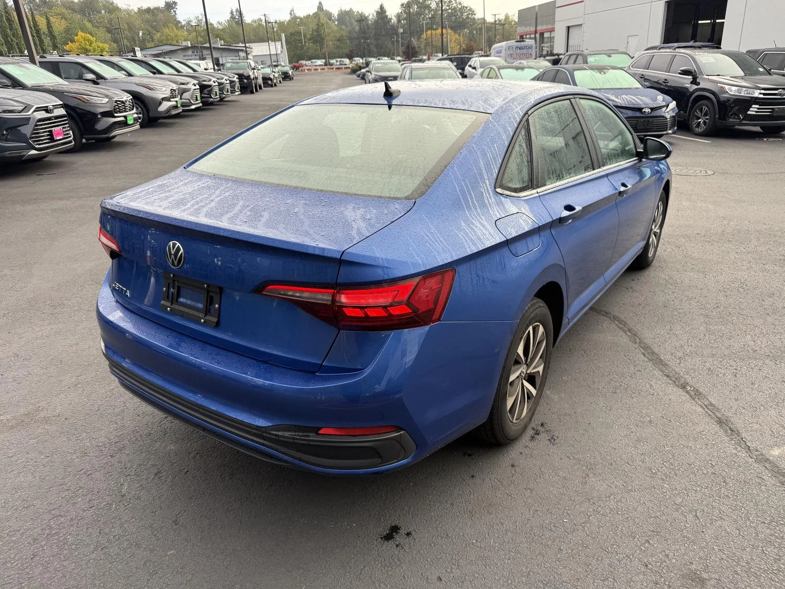 Used 2024 Rising Blue Metallic Volkswagen S image 5