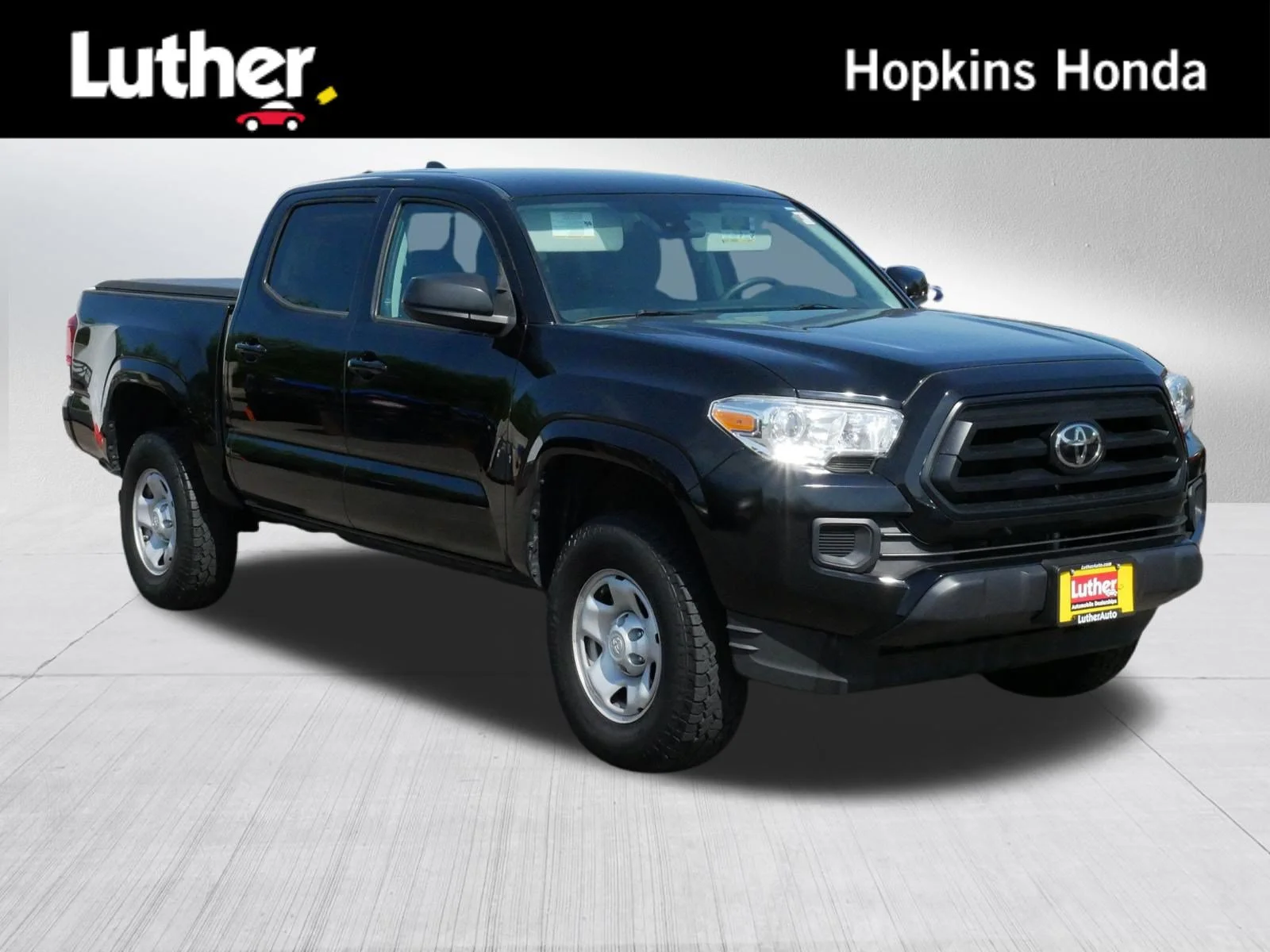 Used 2021 Midnight Black Metallic Toyota SR image 1