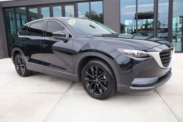 Used 2023 Jet Black Mazda Touring Plus image 1